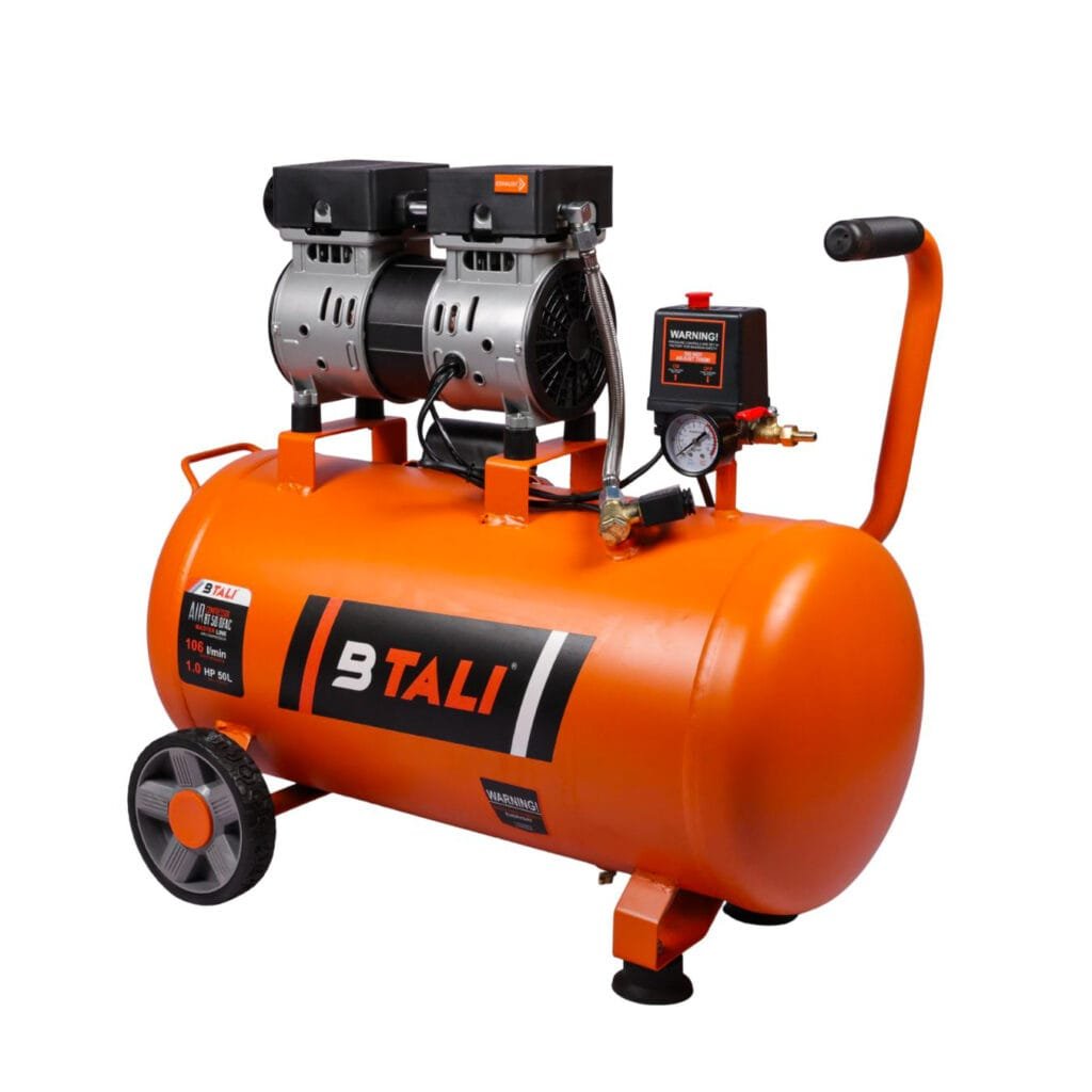 Compact Btali BT 50 1 HP oil free air compressor delivering clean air from a 50L tank for dental units and industrial workspaces.
