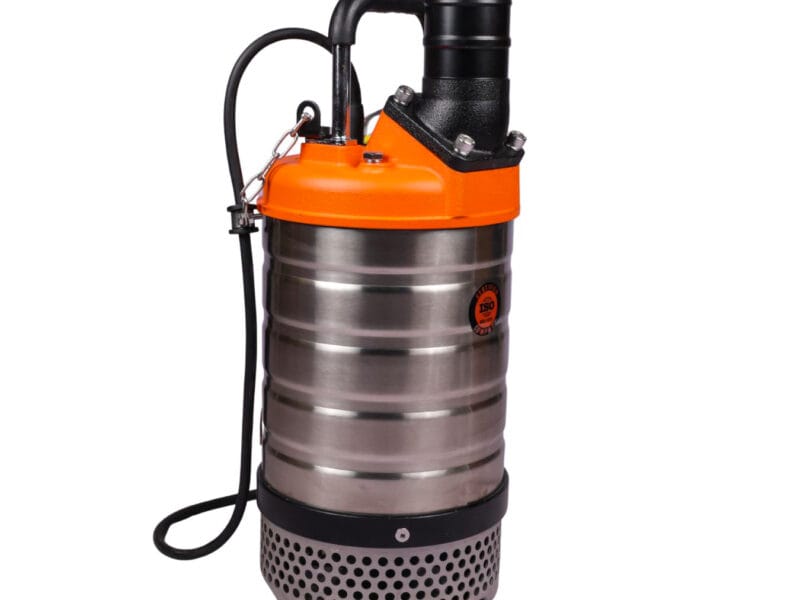 A professional technician inspecting a stainless steel submersible pump motor to prevent overheating in a borewell.