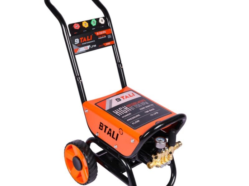 Btali International professional bike washer gun for high pressure cleaning of motorcycles in a detailing studio setup.