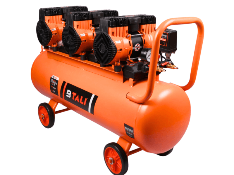 A professional technician performing maintenance on an industrial air compressor to ensure peak operational performance.