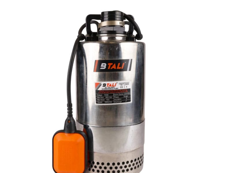 A high-efficiency solar powered submersible pump installed in an Indian agricultural borewell for irrigation.